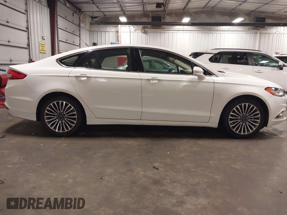 2017 Ford Fusion SE with VIN 3FA6P0HD6HR310295, listed as a IAAI auction lot 42590311 with 163,904 mi miles and . Bid and sale history available at DreamBid. Image 14.