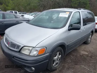 2002 Pontiac Montana with VIN 1GMDX03E92D261204, listed as a IAAI auction lot 41514460 with 175,551 mi miles and . Bid and sale history available at DreamBid. Image 2.