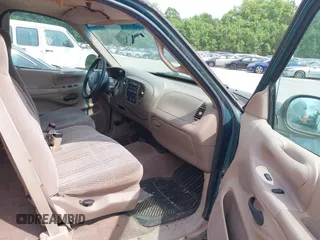1997 Ford F-150 с VIN 1FTDX1767VKB25120, выставлен на аукционе IAAI как лот 42471027 с пробегом 155 877 миль миль и . История ставок и продаж доступна на DreamBid. Изображение 5.
