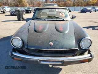 1979 FIAT 124 Spider z VIN 124CS20151060, wystawiony jako Copart lot #78019714 z przebiegiem 95 504 mil mil oraz Czysty tytuł • Clean title. Historia ofert i sprzedaży dostępna na DreamBid. Obrazek 5.
