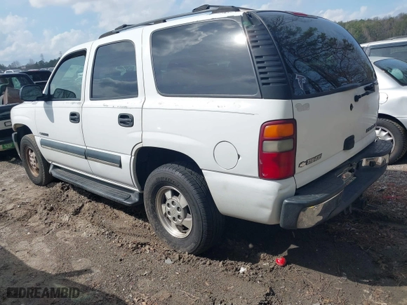 2003 Chevrolet Tahoe LT with VIN 1GNEC13Z33J145665, listed as a IAAI auction lot 41807970 with 307,997 mi miles. Bid and sale history available at carsss.com. Image 3.