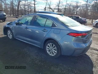 2023 Toyota Corolla Hybrid LE with VIN JTDBCMFE4P3025924, listed as a IAAI auction lot 41463750 with 9,553 mi miles. Bid and sale history available at carsss.com. Image 3.