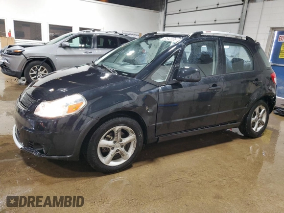 2009 Suzuki SX4 Touring AWD with VIN JS2YB417496202243, listed as a Copart auction lot 53842055 with 70,544 mi miles and Salvage Title. Bid and sale history available at DreamBid. Image 1.