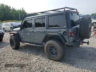 2018 Jeep Wrangler Unlimited Sport S with VIN 1C4HJXDG0JW281103, listed as a Copart auction lot 60400565 with 112,485 mi miles and Salvage title. Bid and sale history available at DreamBid. Image 2.