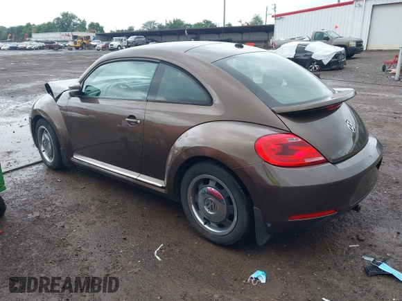 2012 Volkswagen Beetle 2.5L PZEV with VIN 3VWJP7AT2CM638265, listed as a IAAI auction lot 42512449 with 137,129 mi miles and . Bid and sale history available at DreamBid. Image 3.