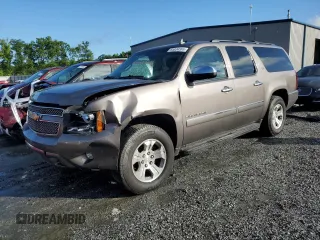 2014 Chevrolet Suburban LTZ with VIN 1GNSCKE07ER108386, listed as a Copart auction lot 55834365 with 221,581 mi miles and Salvage title. Bid and sale history available at DreamBid. Image 1.