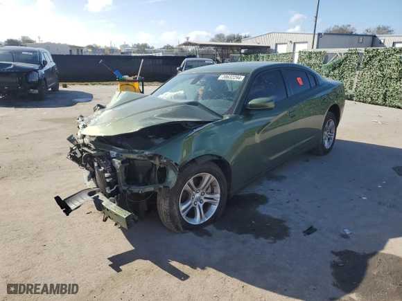 2022 Dodge Charger SXT with VIN 2C3CDXBG8NH243843, listed as a Copart auction lot 39632294 with 20,704 mi miles and Non Repairable. Bid and sale history available at carsss.com. Image 1.
