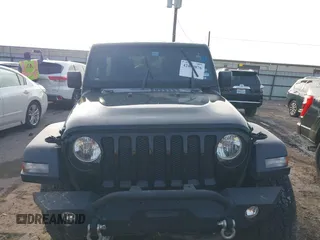 2020 Jeep Wrangler Unlimited Sport S with VIN 1C4HJXDN2LW165046, listed as a IAAI auction lot 42400876 with 92,100 mi miles and . Bid and sale history available at DreamBid. Image 12.
