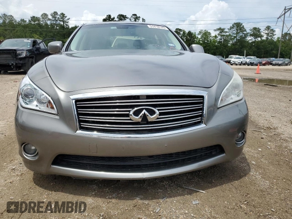 2013 Infiniti M z VIN JN1BY1AP8DM513632, wystawiony jako Copart lot #41443245 z przebiegiem 151 701 mil mil oraz Szkoda całkowita • Salvage title. Historia ofert i sprzedaży dostępna na DreamBid. Obrazek 5.