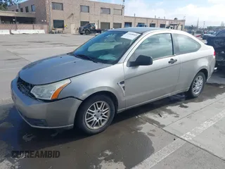 2008 Ford Focus SE with VIN 1FAHP33NX8W135881, listed as a IAAI auction lot 41668949 with 160,261 mi miles. Bid and sale history available at carsss.com. Image 19.