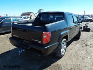 2011 Honda Ridgeline RTL with VIN 5FPYK1F53BB008207, listed as a IAAI auction lot 41745089 with 160,170 mi miles. Bid and sale history available at carsss.com. Image 4.