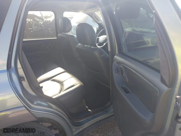 2004 Mazda Tribute ES with VIN 4F2CZ06184KM32333, listed as a IAAI auction lot 42041183 with 33,646 mi miles. Bid and sale history available at carsss.com. Image 8.