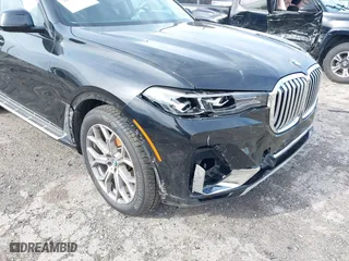 2021 BMW X7 xDrive40i with VIN 5UXCW2C08M9E57046, listed as a IAAI auction lot 41601223 with 43,988 mi miles. Bid and sale history available at carsss.com. Image 6.