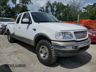 2003 Ford F-150 XL with VIN 1FTRX07W13KC28871, listed as a Copart auction lot 59003245 with 180,197 mi miles and Salvage title. Bid and sale history available at DreamBid. Image 4.