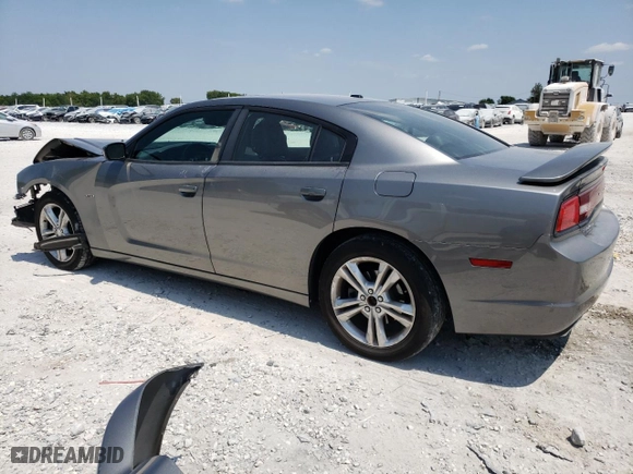 2011 Dodge Charger RT Max with VIN 2B3CM5CT7BH572445, listed as a Copart auction lot 66782634 with 129,743 mi miles and Salvage Title. Bid and sale history available at carsss.com. Image 2.