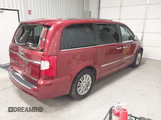 2015 Chrysler Town & Country Limited Platinum with VIN 2C4RC1GGXFR597180, listed as a IAAI auction lot 41374817 with 90,088 mi miles and . Bid and sale history available at DreamBid. Image 4.