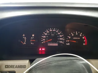 2000 Nissan Frontier XE with VIN 1N6DD26S8YC337811, listed as a Copart auction lot 54775915 with 129,427 mi miles and Salvage title. Bid and sale history available at DreamBid. Image 9.