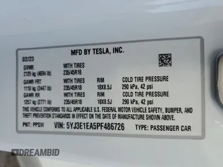 2023 Tesla Model 3 with VIN 5YJ3E1EA5PF486726, listed as a Copart auction lot 51659655 with 14,632 mi miles and Salvage title. Bid and sale history available at DreamBid. Image 15.