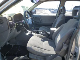 1999 Isuzu Rodeo S with VIN 4S2CK58WXX4373485, listed as a Copart auction lot 87804995 with 246,518 mi miles and Salvage title. Bid and sale history available at DreamBid. Image 7.