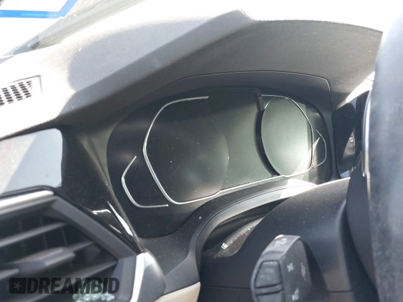 2021 BMW 3 Series 330i z VIN 3MW5R1J03M8B71429, wystawiony jako IAAI lot #42290683 z przebiegiem Nie podano mil oraz . Historia ofert i sprzedaży dostępna na DreamBid. Obrazek 15.