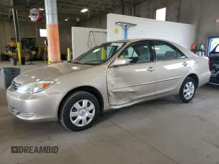 2004 Toyota Camry LE with VIN 4T1BE32K74U872664, listed as a Copart auction lot 61216195 with 216,273 mi miles and Salvage title. Bid and sale history available at DreamBid. Image 1.