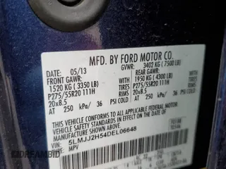 2013 Lincoln Navigator z VIN 5LMJJ2H54DEL06648, wystawiony jako Copart lot #47975275 z przebiegiem 189 591 mil mil oraz Szkoda całkowita • Salvage title. Historia ofert i sprzedaży dostępna na DreamBid. Obrazek 14.