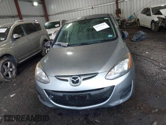 2013 Mazda 2 Sport with VIN JM1DE1KY1D0167999, listed as a IAAI auction lot 41713546 with 204,443 mi miles and . Bid and sale history available at DreamBid. Image 12.