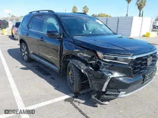2024 Honda Pilot Touring with VIN 5FNYG1H77RB043593, listed as a IAAI auction lot 41702362 with 12,735 mi miles. Bid and sale history available at carsss.com. Image 1.