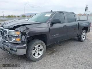 2014 Chevrolet Silverado 1500 LT with VIN 3GCUKREC7EG561639, listed as a IAAI auction lot 42020364 with 154,785 mi miles. Bid and sale history available at carsss.com. Image 2.
