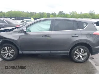 2018 Toyota RAV4 XLE with VIN 2T3RFREV5JW701564, listed as a IAAI auction lot 41976067 with 128,404 mi miles. Bid and sale history available at carsss.com. Image 14.