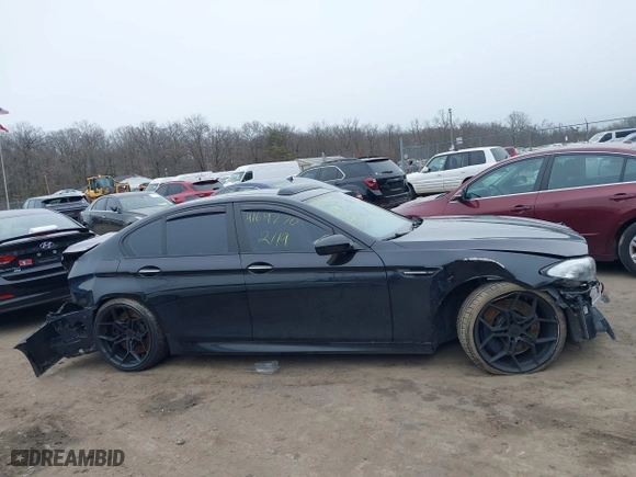 2013 BMW M5 with VIN WBSFV9C52DD096793, listed as a IAAI auction lot 41619270 with 1 mi miles. Bid and sale history available at carsss.com. Image 13.