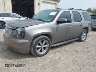 2007 GMC Yukon SLT with VIN 1GKFC13057R126741, listed as a IAAI auction lot 41910018 with 244,921 mi miles. Bid and sale history available at carsss.com. Image 2.
