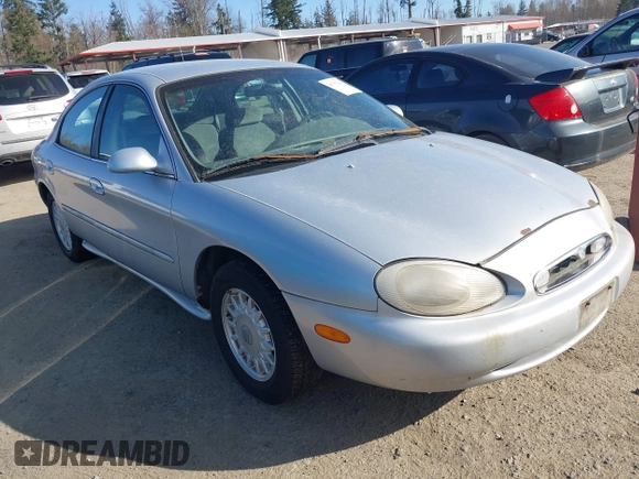 1996 Mercury Sable GS with VIN 1MELM50U5TG605997, listed as a IAAI auction lot 41751266 with 179,662 mi miles. Bid and sale history available at carsss.com. Image 1.