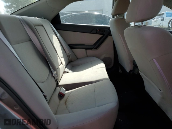 2010 Kia Forte EX z VIN KNAFU4A27A5260564, wystawiony jako Copart lot #55440345 z przebiegiem 169 444 mil mil oraz Szkoda całkowita • Salvage title. Historia ofert i sprzedaży dostępna na DreamBid. Obrazek 10.