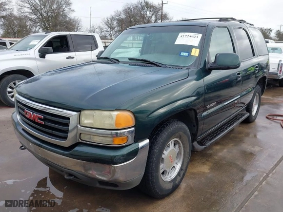 2002 GMC Yukon SLT with VIN 1GKEC13Z52R174419, listed as a IAAI auction lot 41724923 with 309,700 mi miles. Bid and sale history available at carsss.com. Image 2.