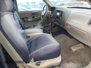 1999 Ford F-150 XL z VIN 1FTRX08L4XKB47888, wystawiony jako IAAI lot #42000396 z przebiegiem 200 461 mil mil oraz . Historia ofert i sprzedaży dostępna na DreamBid. Obrazek 5.