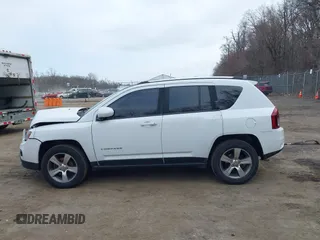 2016 Jeep Compass Latitude with VIN 1C4NJDEBXGD737018, listed as a IAAI auction lot 41800071 with 158,006 mi miles. Bid and sale history available at carsss.com. Image 14.