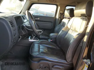 2007 Hummer H3 SUV with VIN 5GTDN13E778241171, listed as a Copart auction lot 82573684 with 148,242 mi miles and Salvage Title. Bid and sale history available at DreamBid. Image 7.