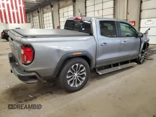 2023 GMC Canyon 4WD Denali with VIN 1GTP6FEK6P1232066, listed as a Copart auction lot 85235884 with 20,165 mi miles and Salvage Title. Bid and sale history available at carsss.com. Image 3.