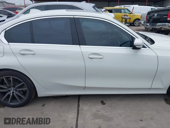 2020 BMW 3 Series 330i with VIN WBA5R1C06LFH40375, listed as a IAAI auction lot 41023872 with 98,325 mi miles and . Bid and sale history available at carsss.com. Image 14.