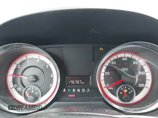 2014 Dodge Grand Caravan SXT with VIN 2C4RDGCG3ER451465, listed as a IAAI auction lot 42111958 with 176,707 mi miles and . Bid and sale history available at DreamBid. Image 7.
