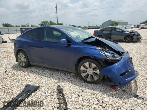 2022 Tesla Model Y Long Range z VIN 7SAYGDEE7NF313228, wystawiony jako Copart lot #55060705 z przebiegiem 32 238 mil mil oraz Szkoda całkowita • Salvage title. Historia ofert i sprzedaży dostępna na DreamBid. Obrazek 4.