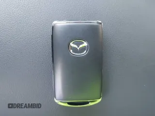 2023 Mazda 3 Premium Plus z VIN JM1BPBNY0P1615814, wystawiony jako IAAI lot #41718577 z przebiegiem Nie podano mil oraz . Historia ofert i sprzedaży dostępna na DreamBid. Obrazek 11.