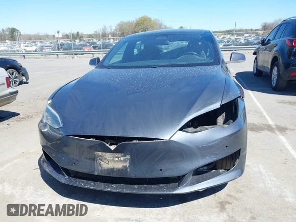 2017 Tesla Model S 100D with VIN 5YJSA1E20HF198503, listed as a IAAI auction lot 41843782 with 77,281 mi miles and . Bid and sale history available at DreamBid. Image 13.
