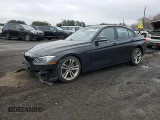 2014 BMW 3 Series 335i xDrive with VIN WBA3B9C53EJ466104, listed as a Copart auction lot 51187095 with 118,101 mi miles and Salvage title. Bid and sale history available at DreamBid. Image 1.