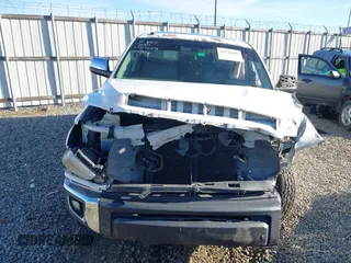2014 Toyota Tundra 4WD Truck LTD with VIN 5TFHW5F16EX372679, listed as a IAAI auction lot 41736049 with 247,000 mi miles. Bid and sale history available at carsss.com. Image 12.