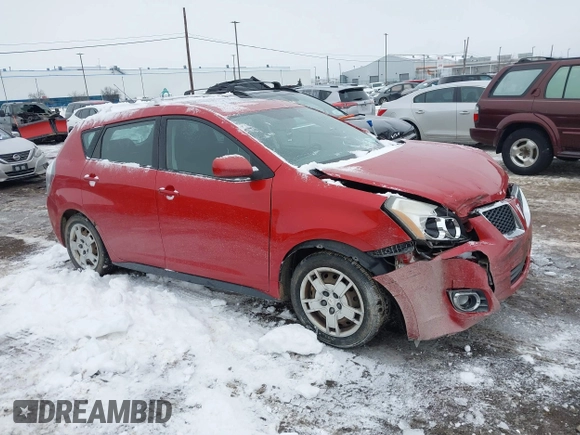 2009 Pontiac Vibe with VIN 5Y2SM67059Z411893, listed as a IAAI auction lot 41446097 with 94,159 mi miles. Bid and sale history available at carsss.com. Image 1.