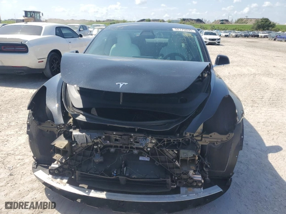 2019 Tesla Model 3 Long Range with VIN 5YJ3E1EB8KF391286, listed as a Copart auction lot 52175035 with 25,384 mi miles and Salvage Title. Bid and sale history available at carsss.com. Image 5.