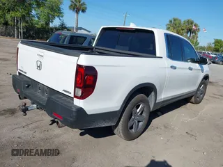 2021 Honda Ridgeline RTL-E with VIN 5FPYK3F7XMB011525, listed as a IAAI auction lot 41774012 with 98,031 mi miles and . Bid and sale history available at DreamBid. Image 4.
