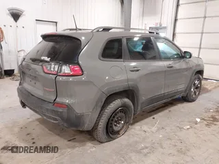 2019 Jeep Cherokee Trailhawk Elite with VIN 1C4PJMBX7KD361203, listed as a IAAI auction lot 41515943 with 133,384 mi miles. Bid and sale history available at carsss.com. Image 4.